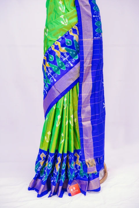 Parrot Green Pochampally Print With Contrast Blue Pallu Border And Blouse