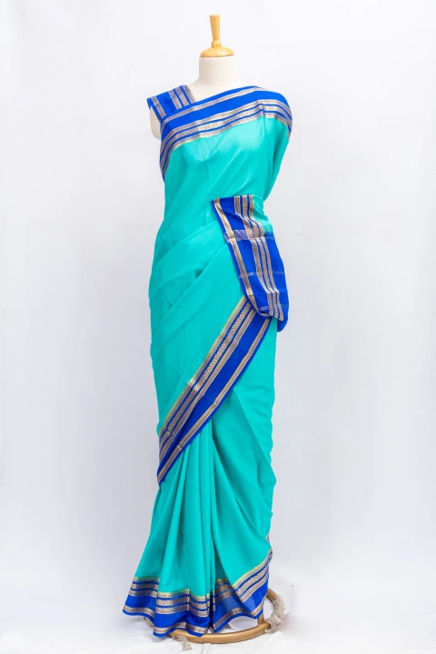 Sky Blue Pure Mysore Crepe Silk With Contrast Pallu Border And Blouse