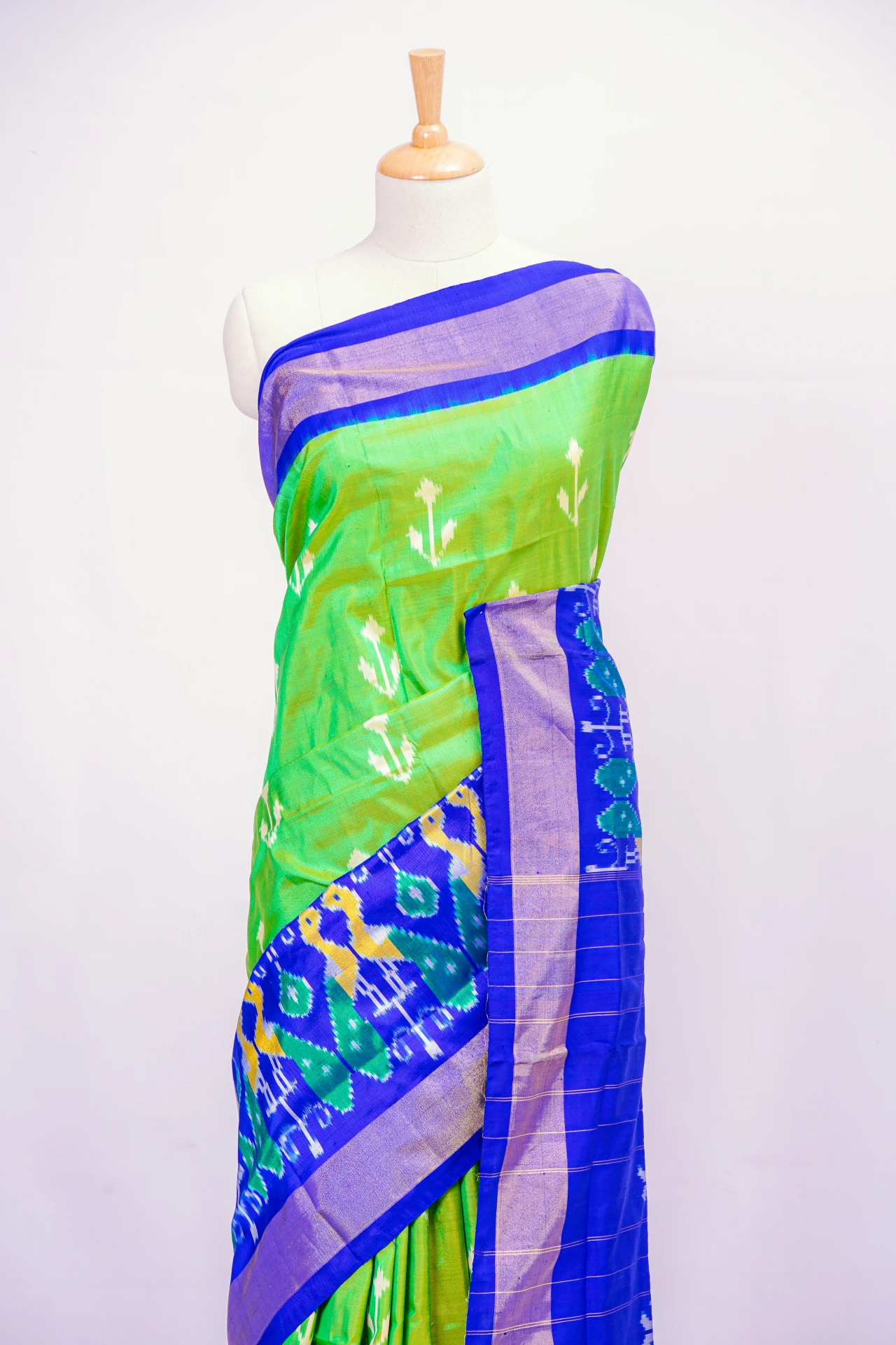 Parrot Green Pochampally Print With Contrast Blue Pallu Border And Blouse